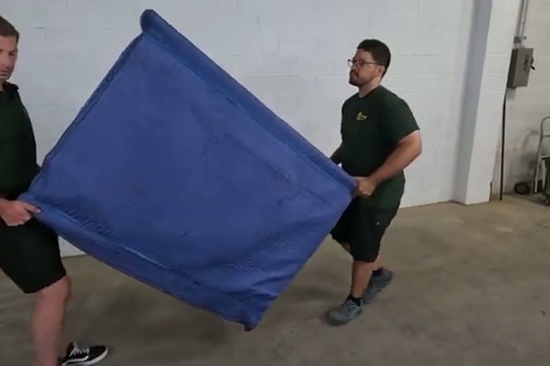 Laying out blankets before the load