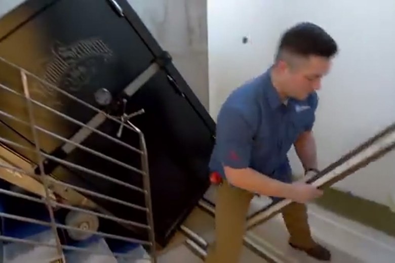 Carrying a bed frame up the stairs